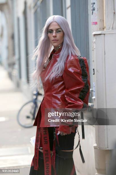 Model and fashion blogger of thenativefox Jennifer Grace wears Han Wen jacket and trousers and Bond jewellery day 2 of Paris Womens Fashion Week...