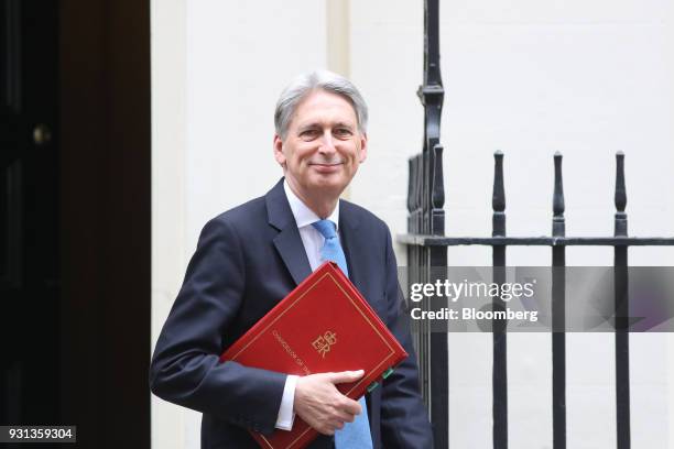 Philip Hammond, U.K. Chancellor of the exchequer, leaves number 11 Downing Street to present the Spring Statement in Parliament in London, U.K., on...