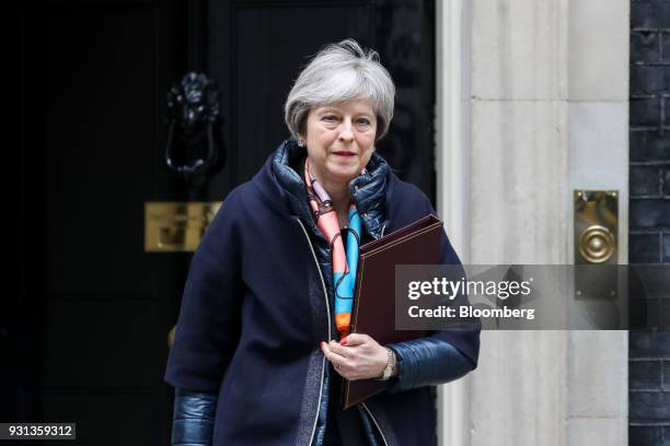 Theresa May, U.K. Prime minister, leaves number 10 Downing Street to listen to the Spring Statement in Parliament in London, U.K., on Tuesday, March...