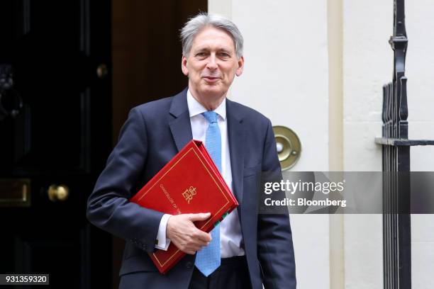 Philip Hammond, U.K. Chancellor of the exchequer, leaves number 11 Downing Street to present the Spring Statement in Parliament in London, U.K., on...