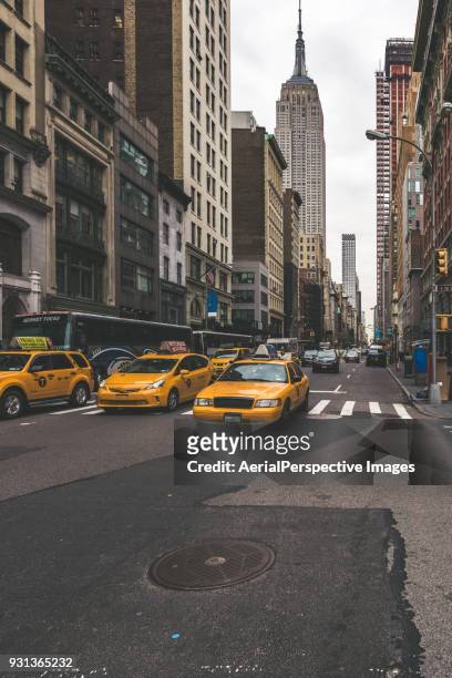 street view with the empire state building, new york, usa - local high street stock pictures, royalty-free photos & images
