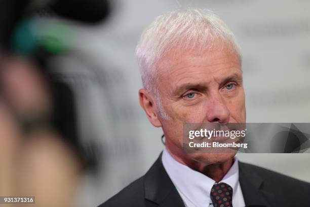 Matthias Mueller, chief executive officer of Volkswagen AG , pauses during a television interview at the automaker's annual media conference in...