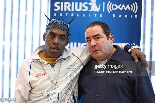 Recording artist Coolio and chef Emeril Lagasse pose for a photograph before a recording of "Entertaining With Martha & Emeril" at the SIRIUS XM...