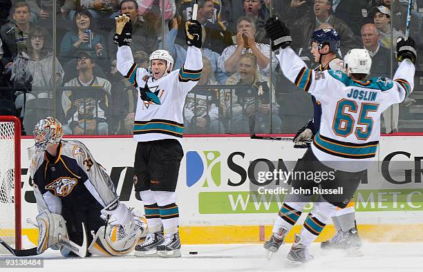 Scott Nichol celebrates a goal with Derek Joslin of the San Jose Sharks against goalie Pekka Rinne of the Nashville Predators on November 17, 2009 at...