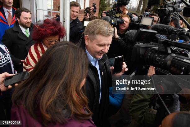 Republican Congressional Candidate Rick Saccone is surrounded by media after voting in the special election to fill the 18th Congressional District...