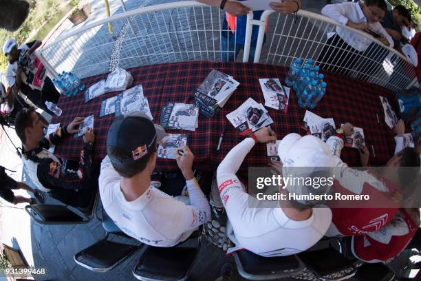 Sebastian Ogier and Sebastien Loeb sign autographs before last stage of the Rally Guanajuato Corona during Day Four of the FIA World Rally...