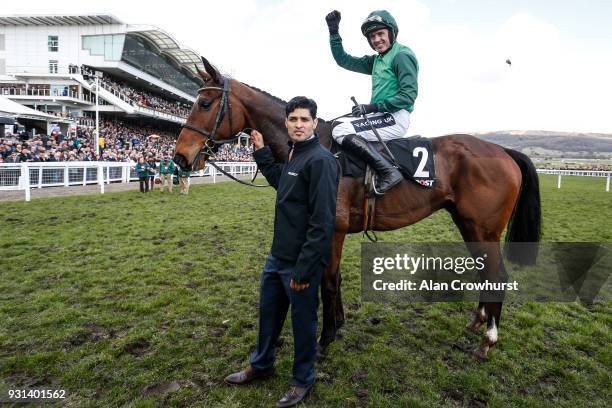 Ruby Walsh riding Footpad celebrate winning The Racing Post Arkle Challenge Trophy Novices' Chase at Cheltenham racecourse on Champion Day on March...