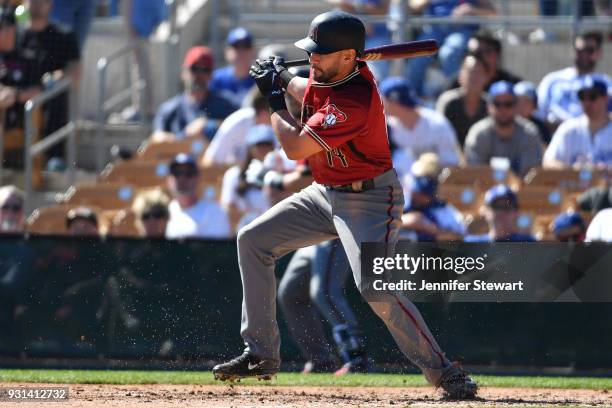 Rey Fuentes of the Arizona Diamondbacks swings at a pitch in a spring-training game against the Los Angeles Dodgers at Camelback Ranch on March 3,...