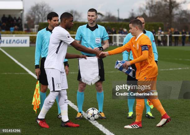 Japhet Tanganga of Tottenham Hotspur Paulo Estrela of FC Porto shake hands during the UEFA Youth League group H match between Tottenham Hotspur and...