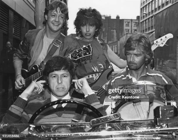 The cast of British children's television programme 'Multi-Coloured Swap Shop' pose in London, to publicise the start of a new series, and the...