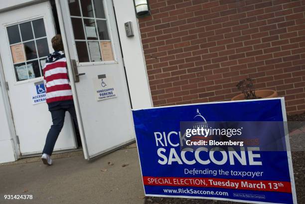 Campaign sign for Rick Saccone, Republican candidate for the U.S. House of Representatives, is displayed outside the Mount Vernon Presbyterian Church...