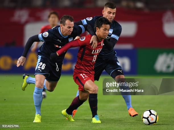 Luke Wilkshire ,Christopher Zuvela of Sydney FC and Atsutaka Nakamura of Kashima Antlers compete for the ball during the AFC Champions League Group H...