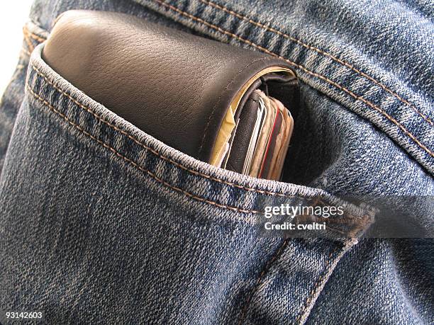 thick leather wallet in back pocket - back pocket stock pictures, royalty-free photos & images