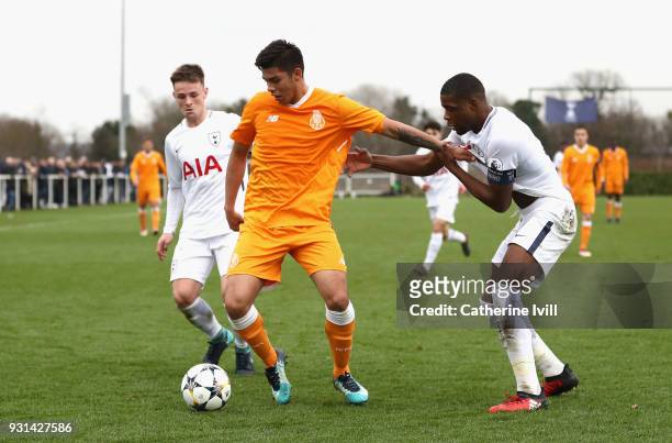 Jamie Reynolds and Japhet Tanganga of Tottenham Hotspur close down Santiago Javier Irala Vera of FC Porto during the UEFA Youth League group H match...