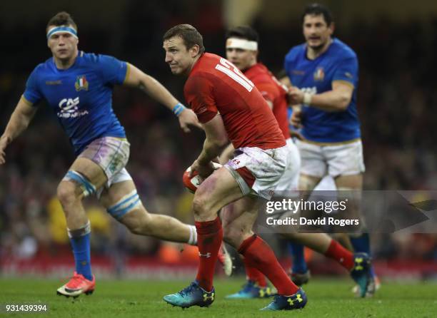 Hadleigh Parkes of Wales looks to pass the ball during the NatWest Six Nations match between Wales and Italy at the Principality Stadium on March 11,...