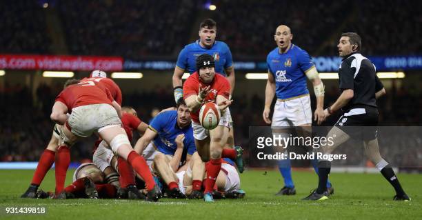 Leigh Halfpenny of Wales passes the ball during the NatWest Six Nations match between Wales and Italy at the Principality Stadium on March 11, 2018...