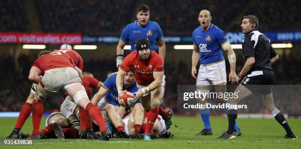 Leigh Halfpenny of Wales passes the ball during the NatWest Six Nations match between Wales and Italy at the Principality Stadium on March 11, 2018...