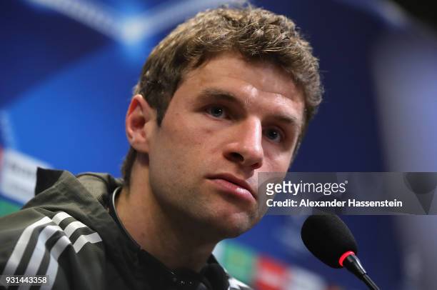 Thomas Mueller of Bayern Muenchen speaks during a Bayern Muenchen training session and press conference ahead of their UEFA Champions League round of...