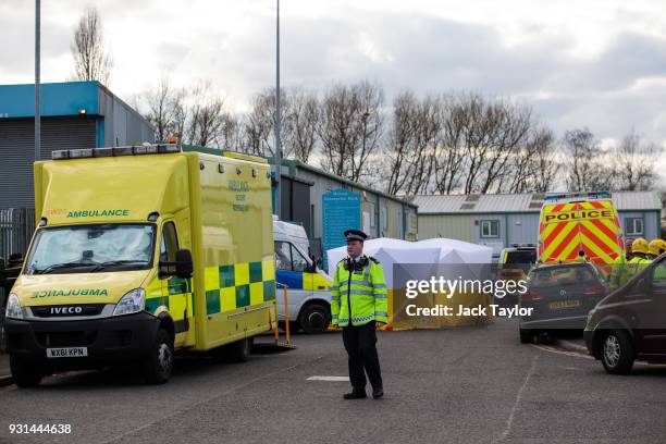 Members of the emergency services on the scene outside a vehicle recovery centre as investigations continue into the poisoning of Sergei Skripal on...