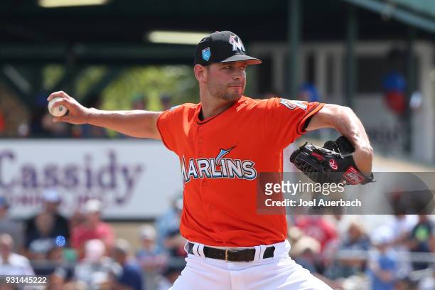 Jacob Turner of the Miami Marlins throws the ball against the New York Yankees during a spring training game at Roger Dean Chevrolet Stadium on March...