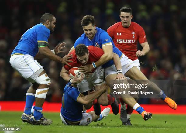 George North of Wales is tackled by Mattia Belllini during the NatWest Six Nations match between Wales and Italy at the Principality Stadium on March...