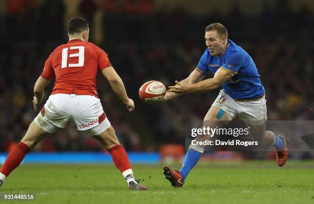 Giulio Bisegni of Italy takes on Owen Watkin during the NatWest Six Nations match between Wales and Italy at the Principality Stadium on March 11,...