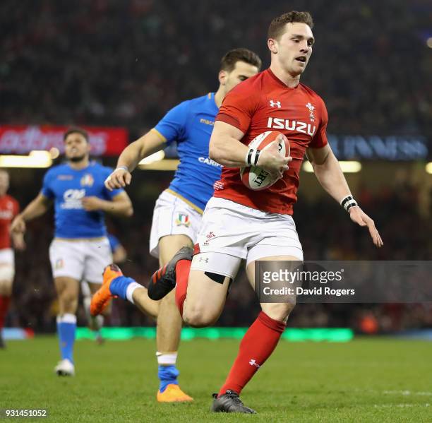 George North of Wales breaks through to score his first try during the NatWest Six Nations match between Wales and Italy at the Principality Stadium...