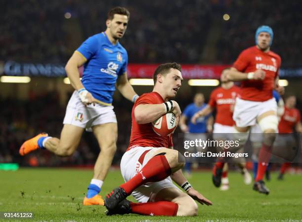 George North of Wales breaks through to score his first try during the NatWest Six Nations match between Wales and Italy at the Principality Stadium...