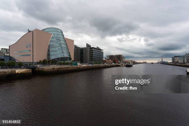 dublin with liffey river and city skyline (dublin/ ireland) - convention centre dublin stock pictures, royalty-free photos & images