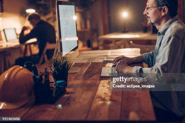 mid adult man in office - man business hipster dark smile stock pictures, royalty-free photos & images