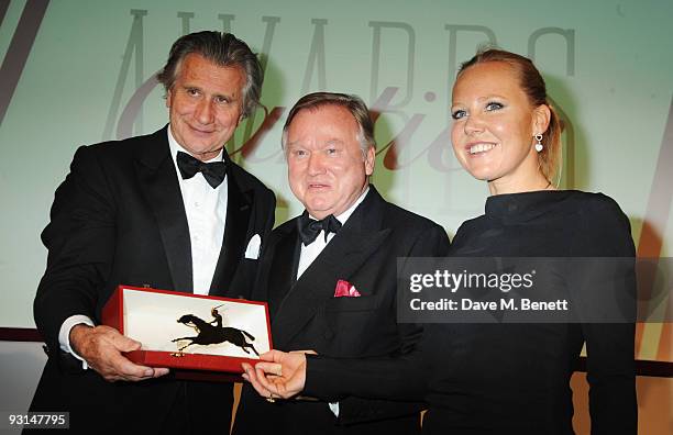 Arnaud Bamberger, Sir Anthony Bamford and Alice Bamford attend the Cartier Racing Awards at Claridges on November 17, 2009 in London, England.