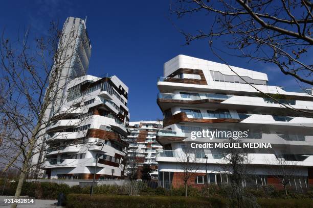 Picture taken on March 13, 2018 shows modern buildings designed by Zaha Hadid Architects in the Citylife neighborghood, western Milan. / AFP PHOTO /...