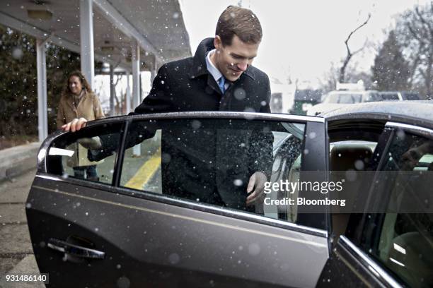 Conor Lamb, Democratic candidate for the U.S. House of Representatives, gets into his vehicle outside the Our Lady of Victory Church polling location...
