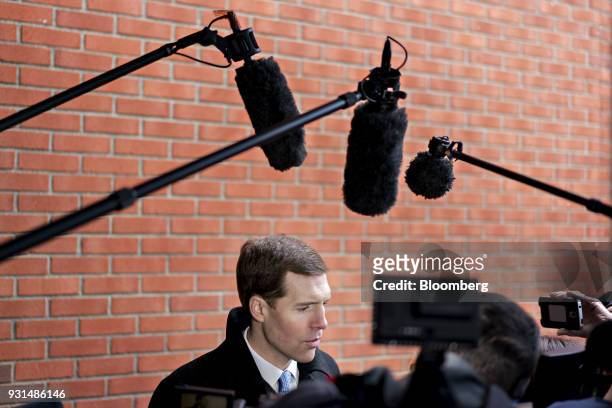 Conor Lamb, Democratic candidate for the U.S. House of Representatives, speaks to members of the media at the Our Lady of Victory Church polling...