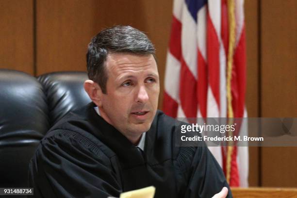 Commissioner Derek Malan speaks during a hearing stemming from domestic violence accusations against Heather Locklear at the Superior Court of...