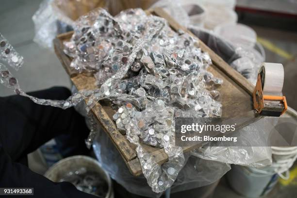 Button cell batteries sit ready for sorting at the Raw Materials Co. Recycling facility in Port Colborne, Ontario, Canada, on Monday, March 5, 2018....