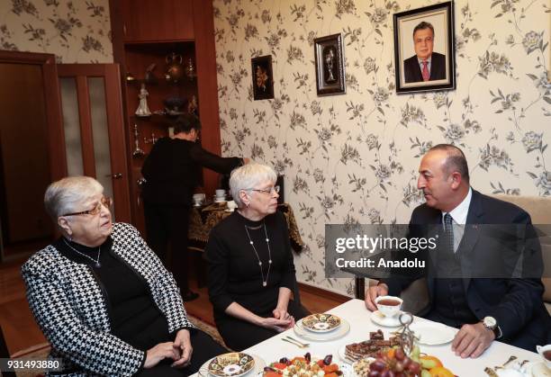 Minister of Foreign Affairs of Turkey, Mevlut Cavusoglu chats with widow Marina Karlov of assassinated Russian ambassador to Turkey Andrey Karlov in...