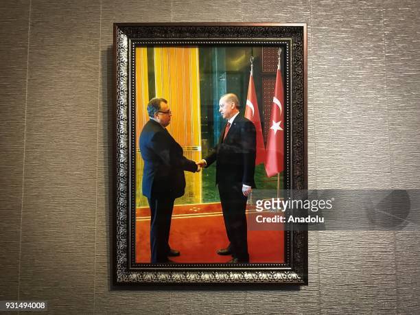 Framed photo of assassinated Russian ambassador to Turkey Andrey Karlov with President of Turkey Recep Tayyip Erdogan is seen hung on the wall in...