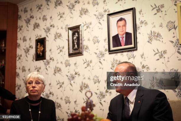 Minister of Foreign Affairs of Turkey, Mevlut Cavusoglu chats with widow Marina Karlov of assassinated Russian ambassador to Turkey Andrey Karlov in...