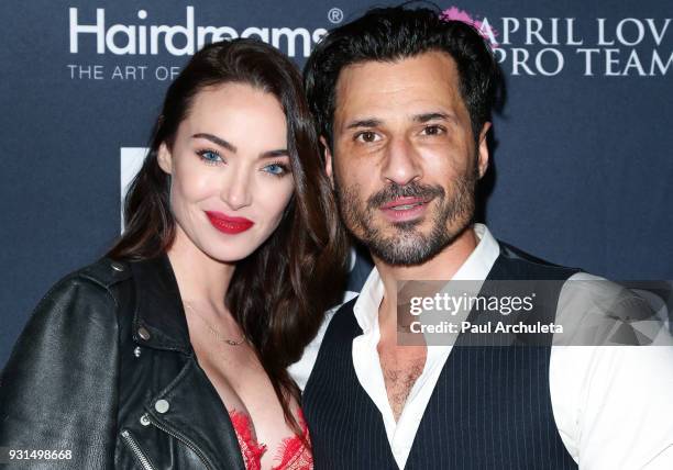 Actress / Model Cassi Colvin and Actor Hal Ozsan attend the Domingo Zapata Fashion Show at the Los Angeles Fashion Week 10th season anniversary at...