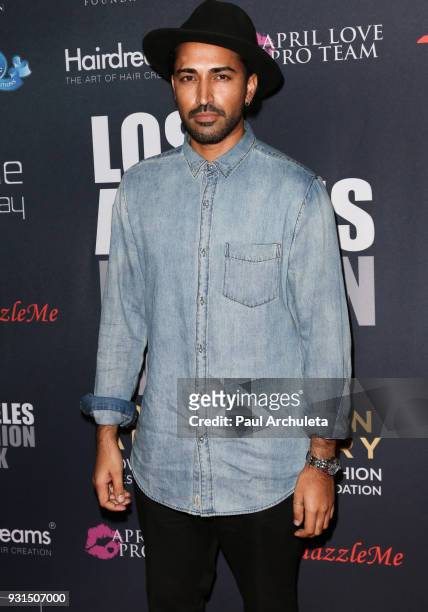 Actor Mahesh Jadu attends the Domingo Zapata Fashion Show at the Los Angeles Fashion Week 10th season anniversary at The MacArthur on March 12, 2018...