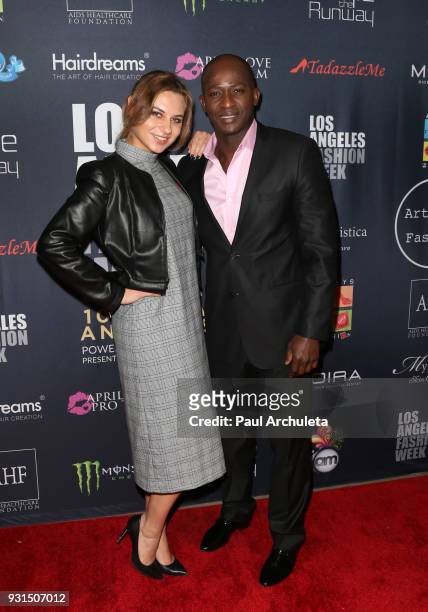 Actor Wills Canga and Ekaterina Yakovleva attend the Domingo Zapata Fashion Show at the Los Angeles Fashion Week 10th season anniversary at The...