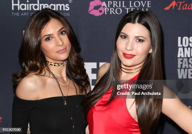 Actors Camila Banus and Celeste Thorson attend the Domingo Zapata Fashion Show at the Los Angeles Fashion Week 10th season anniversary at The...