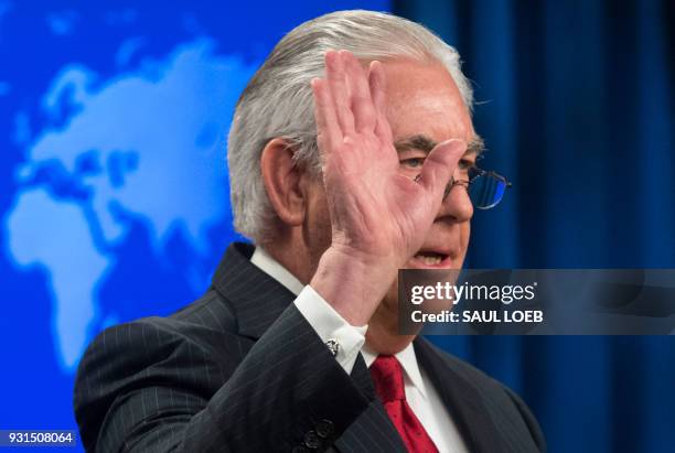 Rex Tillerson, outgoing US Secretary of State gestures as he makes a statement after his dismissal at the State Department in Washington, DC, March...