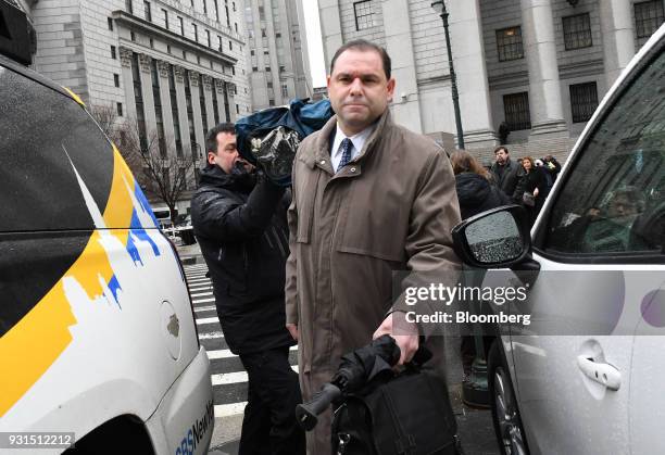 Joseph Percoco, a former top aide to Governor Andrew Cuomo, center, exits federal court in New York, U.S., on Tuesday, March 13, 2018. Percoco was...