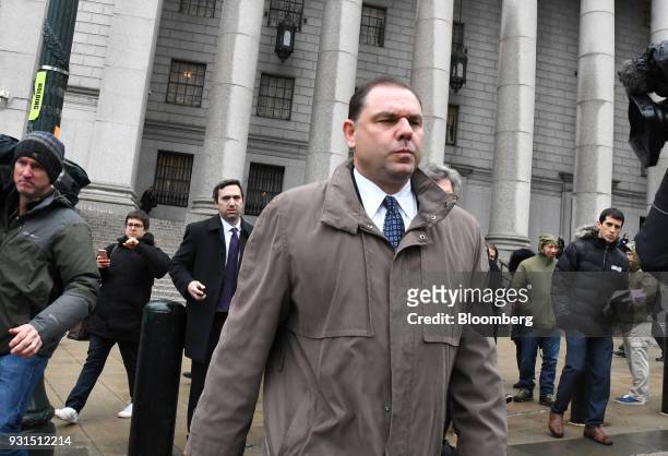 Joseph Percoco, a former top aide to Governor Andrew Cuomo, center, exits federal court in New York, U.S., on Tuesday, March 13, 2018. Percoco was...