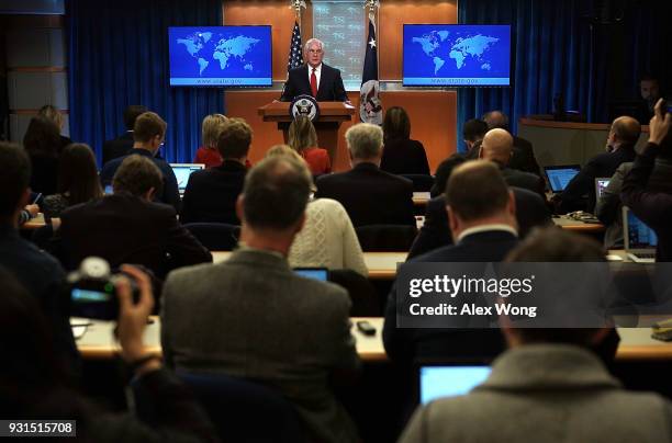 Outgoing U.S. Secretary of State Rex Tillerson makes a statement on his departure from the State Department March 13, 2018 at the State Department in...