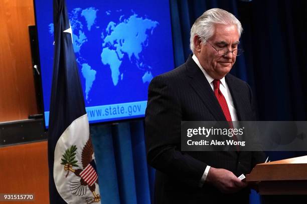 Outgoing U.S. Secretary of State Rex Tillerson leaves after he made a statement on his departure from the State Department March 13, 2018 at the...