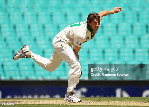 Brendan Drew of the Tigers bowls during day two of the Sheffield Shield match between the New South Wales Blues and the Tasmanian Tigers at Sydney...