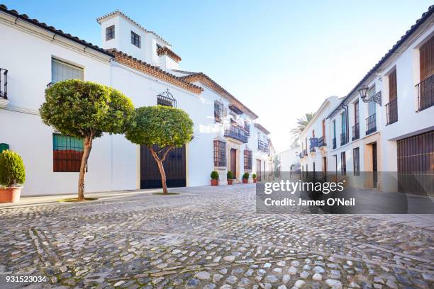 empty backroad in spanish town, ronda, spain - spain street stock pictures, royalty-free photos & images